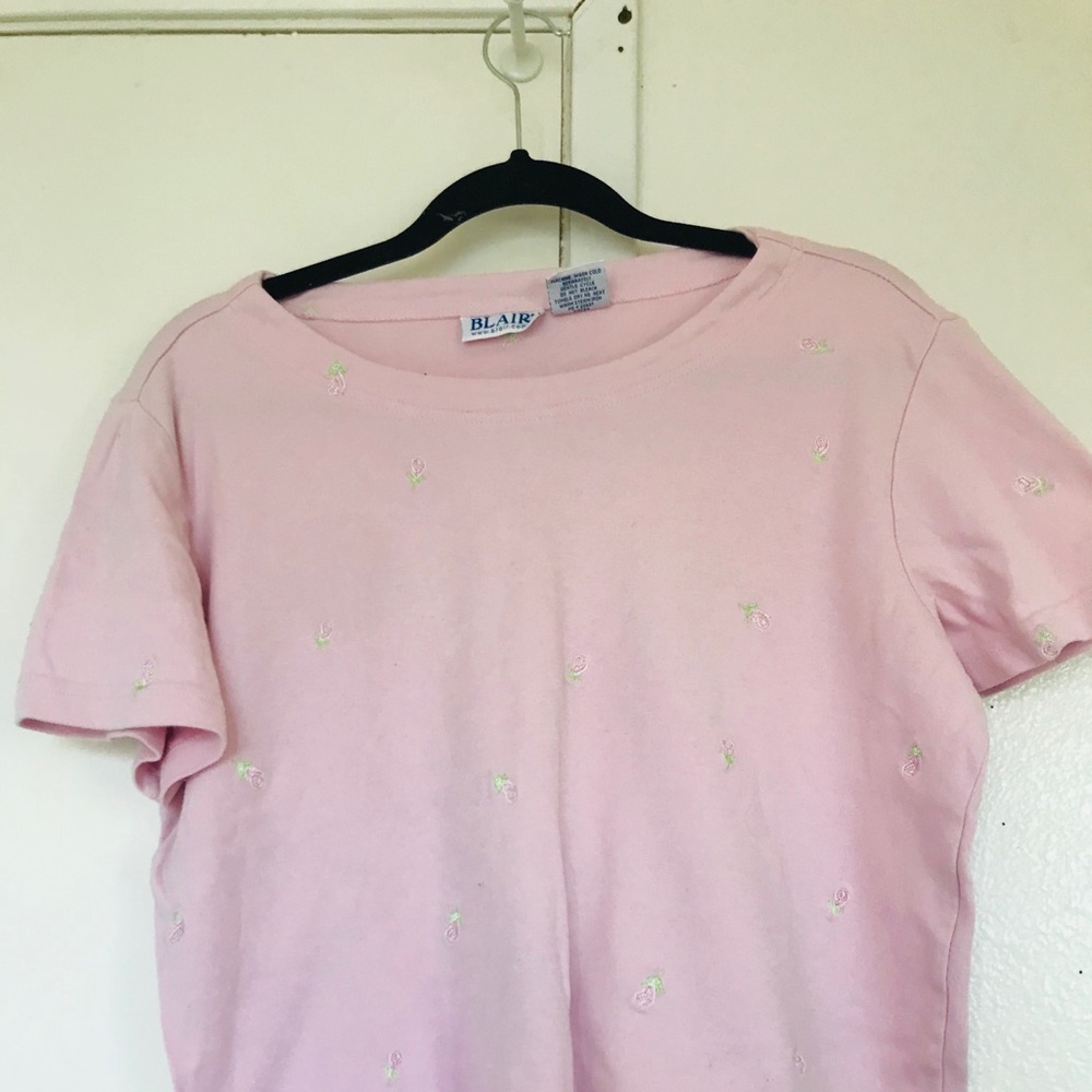pink embroidered shirt